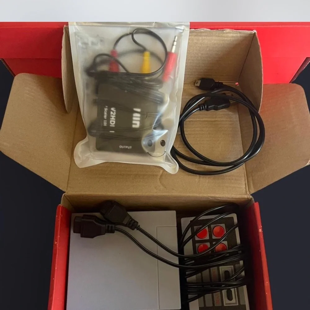 Nintendo gray mini console with wired controller